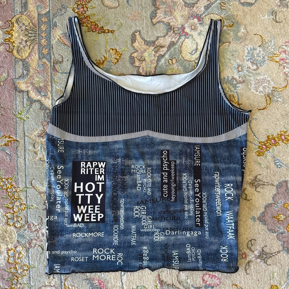 cute graphic top! would go well w a jean skirt ˚ʚ♡ɞ˚